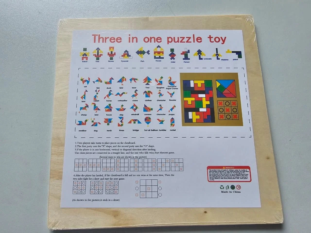 Three in one puzzle toy with instructions on a gray background