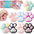 Colorful paw-shaped squishies with packaging and hands squeezing them.