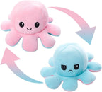 Two plush octopus toys, one pink and one blue, with a smiley face on a white background.
