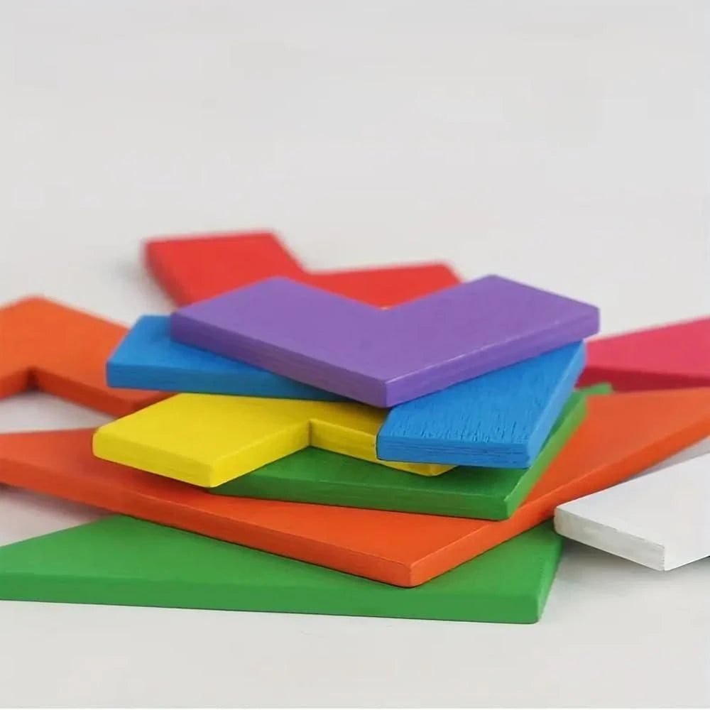 Colorful foam puzzle pieces on a white background