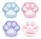 Four colorful cat paw-shaped pads on a white background
