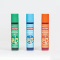 Three colorful bottles of soap on a white background