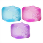 Three colorful ice cube-shaped dog toys with 'Nee Doo' branding on a white background.