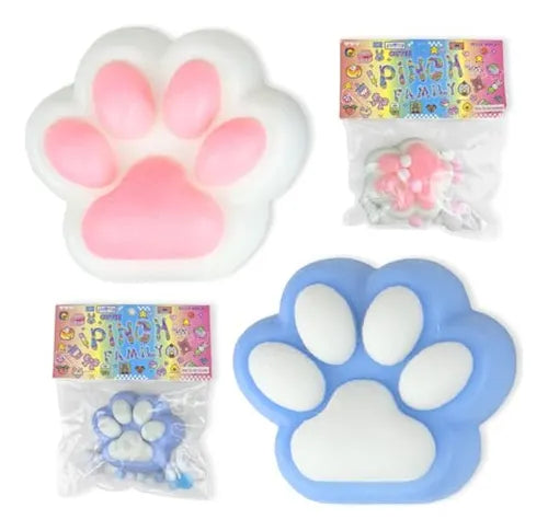 Pink and blue paw-shaped toys with packaging on a white background