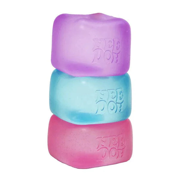 Three stacked dog toys in purple, blue, and pink on a white background